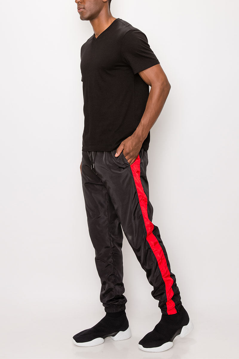 STRIPED WINDBREAKER TRACK PANTS - BLACK/RED