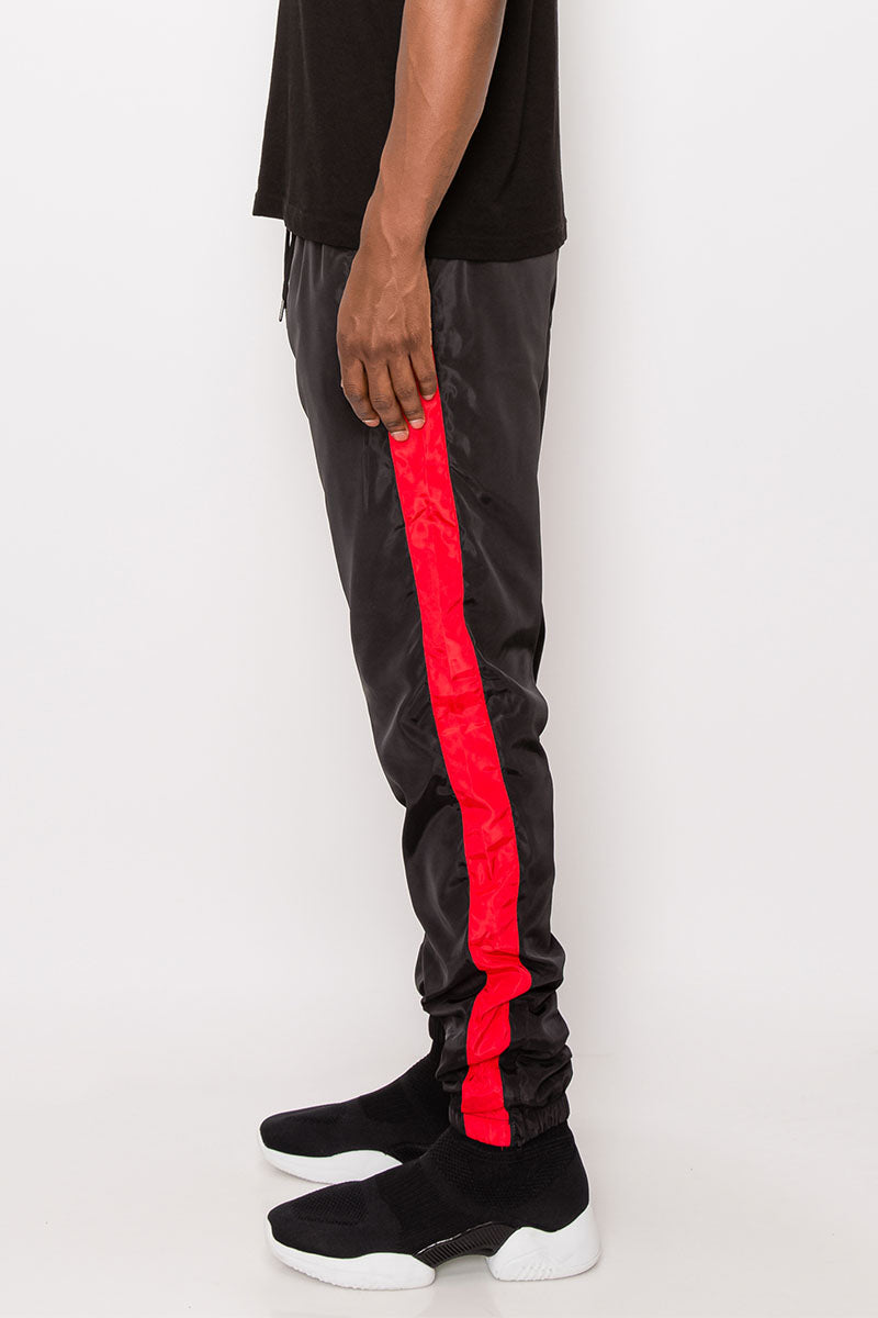 STRIPED WINDBREAKER TRACK PANTS - BLACK/RED