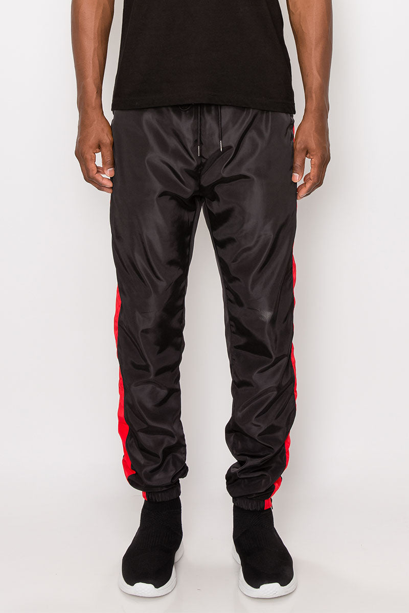 STRIPED WINDBREAKER TRACK PANTS - BLACK/RED
